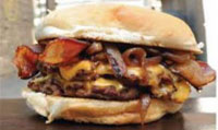 Image of $10 for a Holy Chuck Signature Burger Combo at Holy Chuck (a $16.36 Value)
