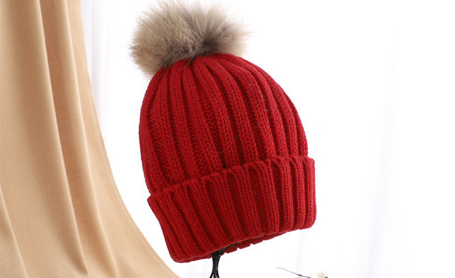 Image of $16.47 for a Knitted Winter Hat with Detachable Pom Pom (a $49 Value)