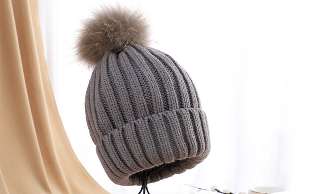 Image of $16.47 for a Knitted Winter Hat with Detachable Pom Pom (a $49 Value)