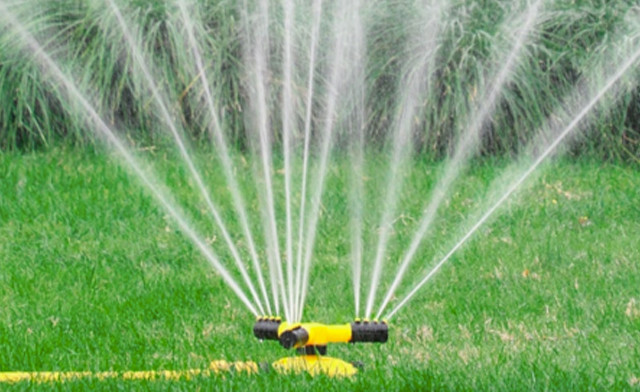 Image of $17.95 for a Triple Head Spinning Sprinkler (a $42.99 Value)