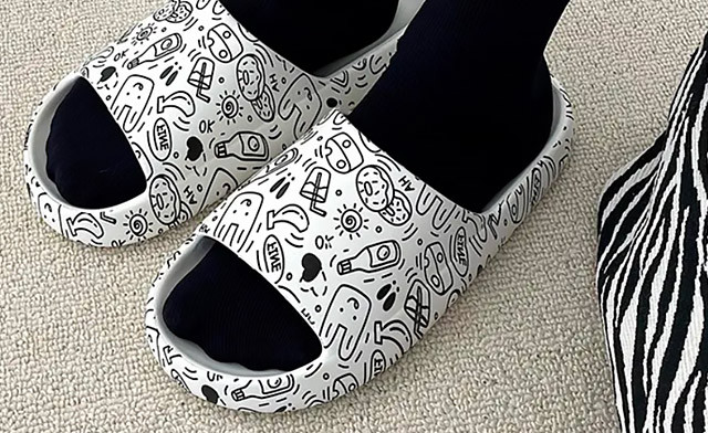 Image of $30.90 for a Pair of Doodle Slides (a $55 Value)