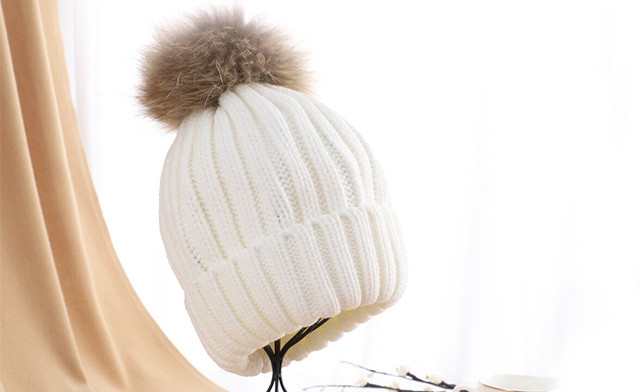 Image of $18.22 for a Knitted Winter Hat with Detachable Pom Pom (a $49 Value)