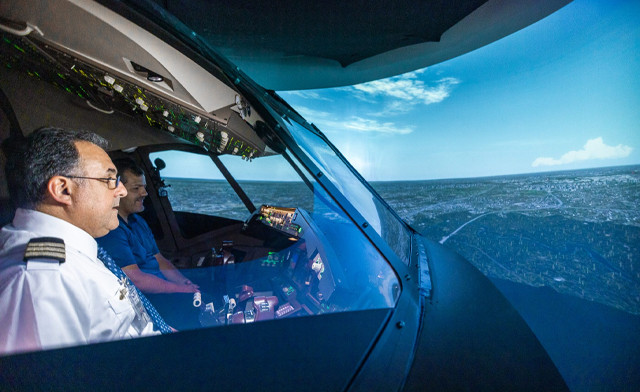 Image of $99 for a 1-Hour Flight Simulator Experience for Up to 2 People in a Replica 777 Cockpit