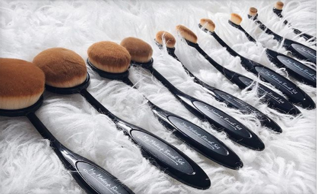 Image of $22.99 for a 10-Piece Black Oval Makeup Brush Set (a $355 Value)